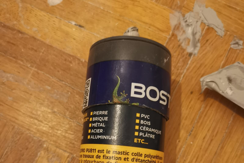 Assemblage d'une cartouche en métal avec une en plastique