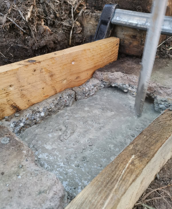 Baisse du niveau du béton après quelques secondes de vibration